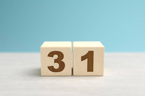 istock Wooden toy blocks forming the number 31. 1277809991