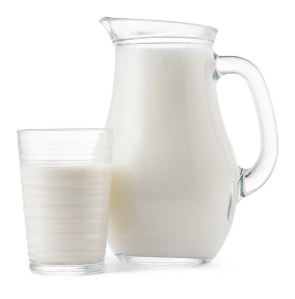 istock Glass jar and cup of fresh milk isolated 1277811302