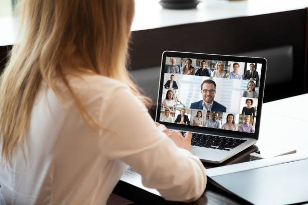 istock People engaged in group videocall, laptop screen webcam application view 1277817955