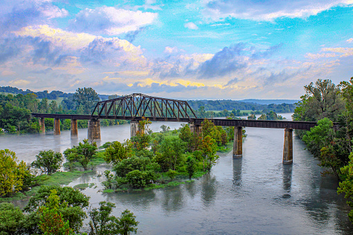 Looking out off the top of the Cotter Bridge over the famous White River and Railroad Bridge in Cotter, Arkansas