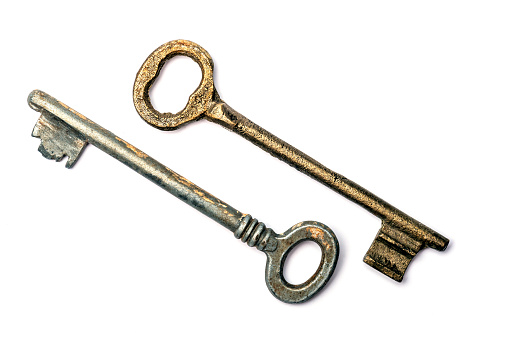 Close up of a round, golden metal door knocker