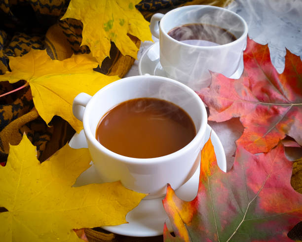 istock coffee cup autumn leaves on concrete background 1277820730