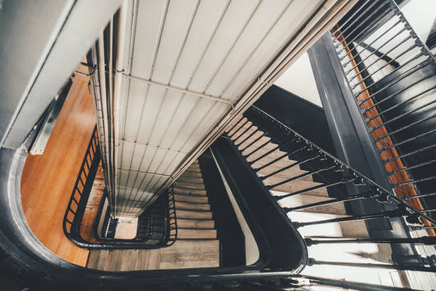 istock Descending stairwell and lift shaft 1277824171