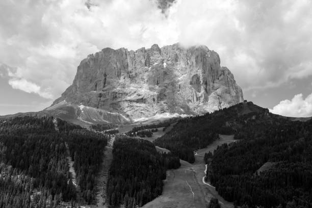 Mountain landscape at summer along the road to Sella pass, Dolomites, Bolzano province, Trentino Alto Adige, Italy. Black and white