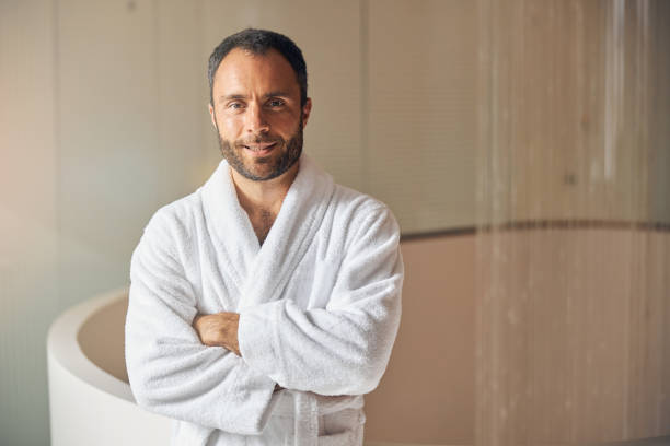 istock Joyful young man standing at wellness center 1277827370
