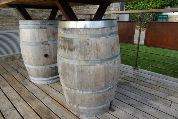 istock Bar table made with wine barrels and wooden planks 1277827482