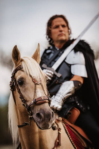 istock Palomino stallion with medieval fantasy knight 1277834315