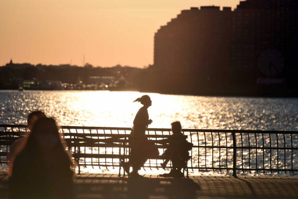 Seattle, Washington State, USA - August 2012: People relaxing in a public park area near Pike Place Market in Seattle