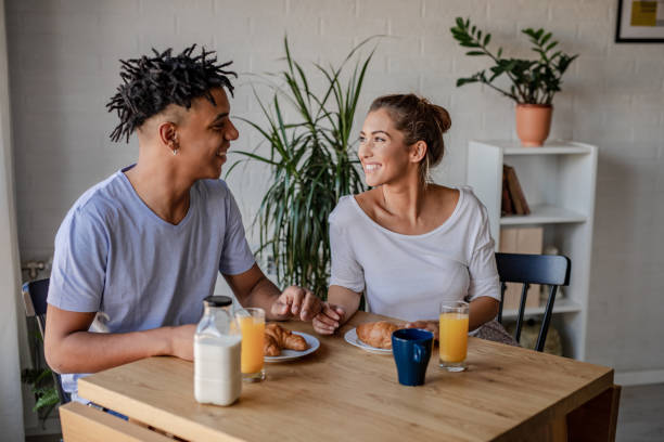 istock Young couple having breakfast at home 1277836117