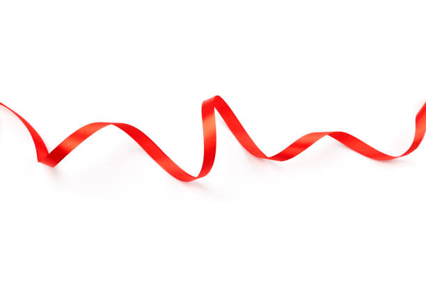 istock beautiful red satin ribbon with curls isolated on white background 1277838413