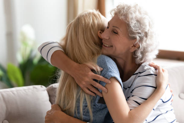 istock Mature mom folding grown daughter to breast reconciling after misunderstanding 1277840314