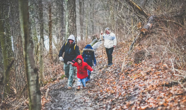 istock Multi generational family hiking in winter 1277841039