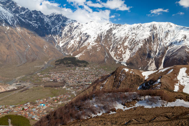 istock View of Stepantsminda townlet at sunny day 1277842737