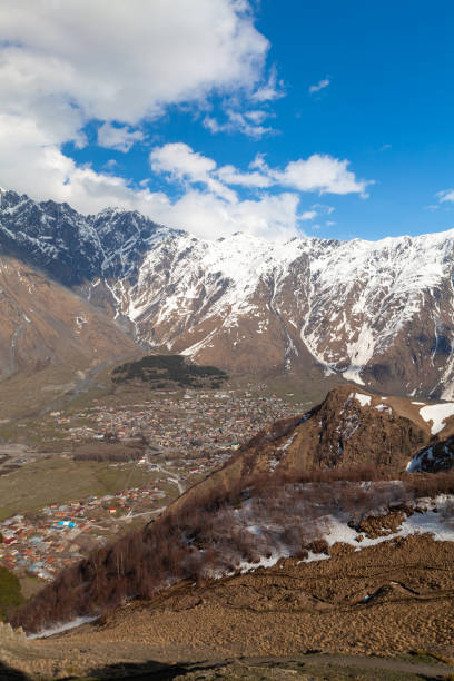 istock View of Stepantsminda at sunny spring day, Georgia 1277842740
