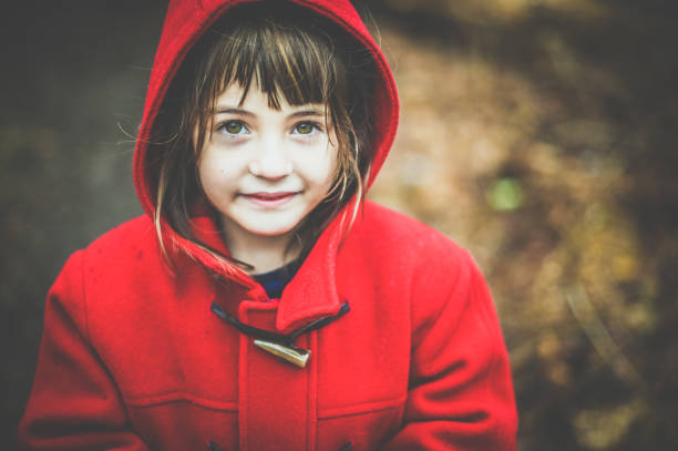 istock Child in red coat outdoors in autumn 1277846211