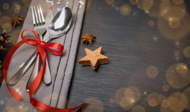 istock Christmas Dinner Table Setting with Cutlery and Winter Spices 1277855307
