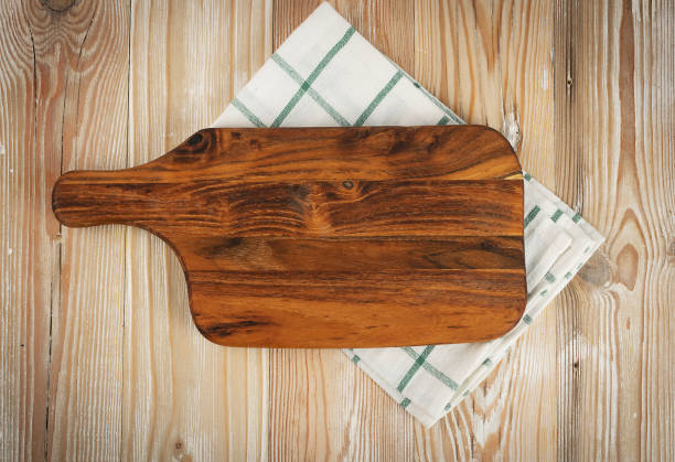 istock Old Wood Cutting Board with a Rustic Napkin Mockup 1277855335