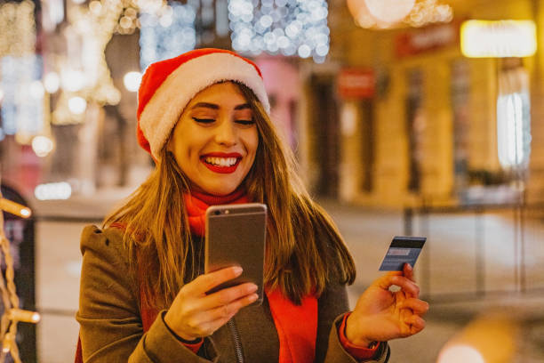 istock Young woman shopping for Christmas 1277855633