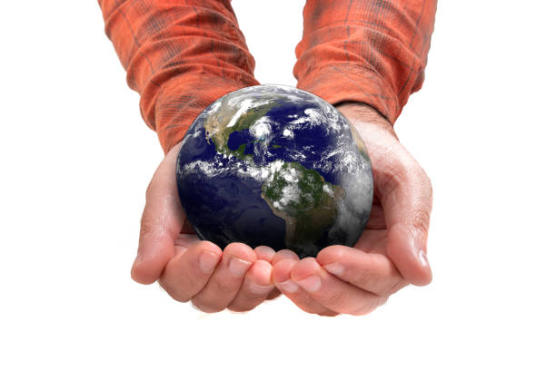 istock man hands holding Planet Earth 1277855758