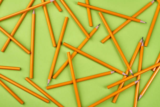istock Yellow pencils on light-green background. 1277857603