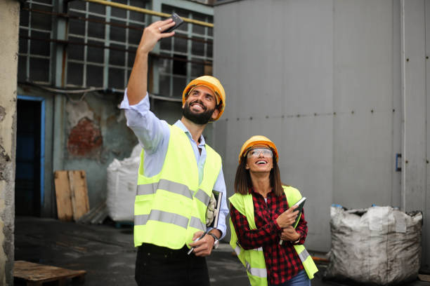 istock Colleagues engineers take a selfies in the workplace after a successful day 1277858537