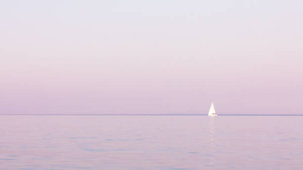 Sailboat in the Croatian coast at sunrise.