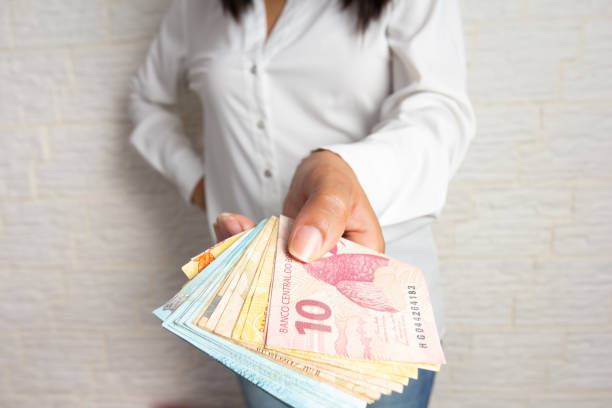 istock pack of cash from Brazil. 1277860267