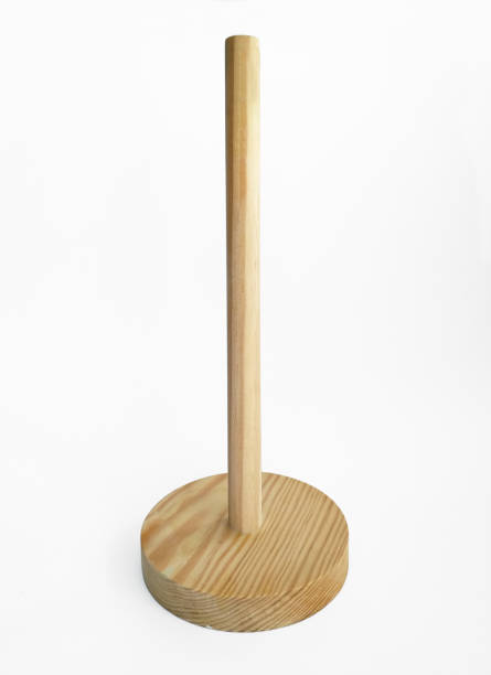istock Wooden kitchen roll holder isolated on white background. Kitchen accessories. Vertical support for kitchen paper rolls, napkins or tissue paper. 1277862540