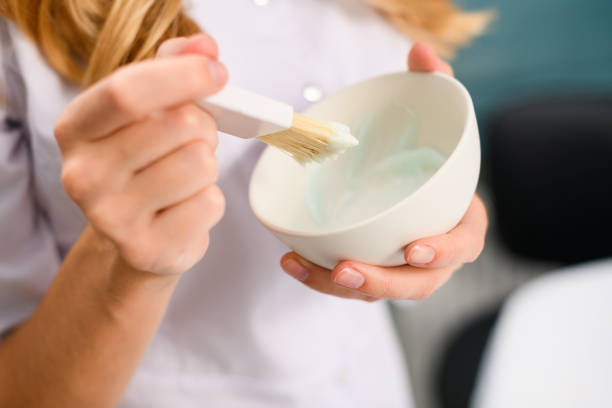 istock Close up cosmetologist hands with salon mask 1277864640