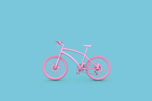 vélo rose 3d sur le fond turquoise - wheel training sports training bicycle photos et images de collection