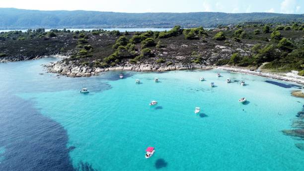istock Boats off Myrsini Beach, Halkidiki, Greece 1277866888