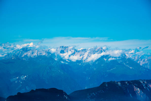 istock clouds sky and peaks of the alps one 1277870200