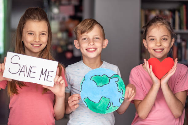 istock Children saying people to save the Earth 1277874426