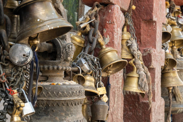 istock Old cast iron, copper and bronze bells held together with metal chains and locks 1277874606