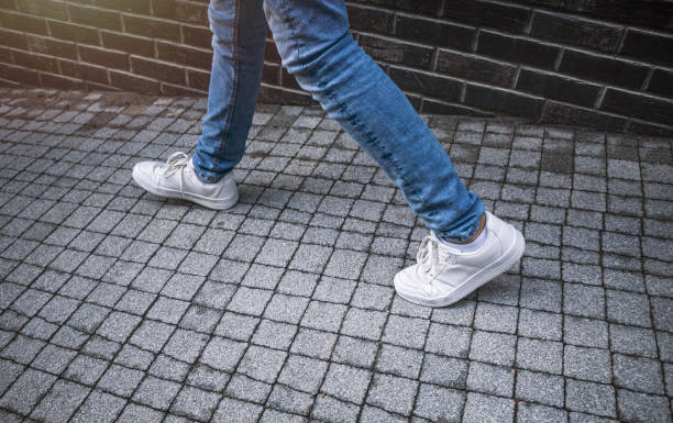 istock Man Walking on the street at sunny day 1277876561