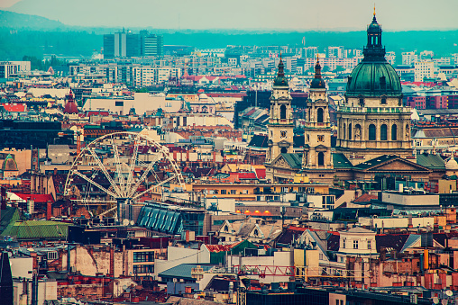 View of Budapest from above, downtown with st.Istvan church and ferris wheel, travel outdoor european Hungary background