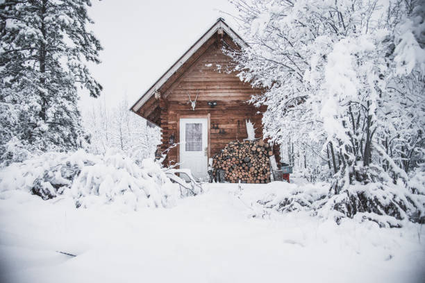 A cozy log cabin in the snow