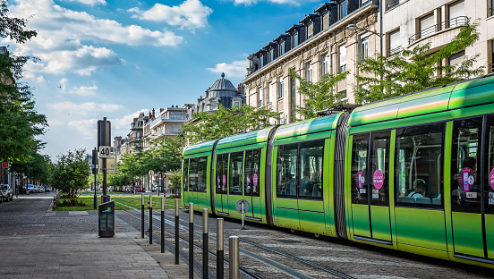 Flourescent green tram taken in Reims, Burgundy, France on 29 June 2018