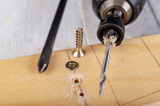 Wood drill bit with adjustable countersink. Carpentry accessories in the workshop. Minor work in the carpentry shop.