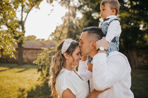 istock Carefree family having fun while running in the park 1277886209