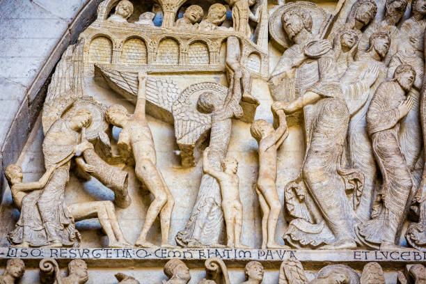 Close up of element of The Last Judgement Tympanum by Gislebertus in Autun Cathedral, Burgundy, France stock photo