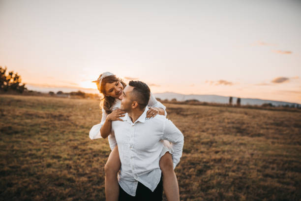 istock Happy couple at public park 1277892041