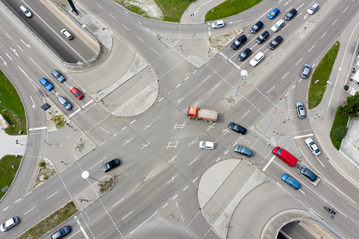 Top aerial view of a car traffic on crossroads.