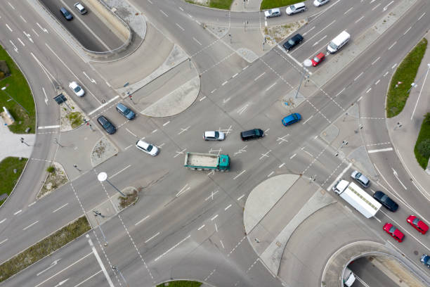 istock Traffic at the intersection of streets, aerial view. 1277894036