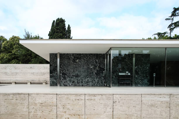 Barcelona, Spain - July 3 2016: Exterior of the Barcelona Pavilion designed by Mies Van Der Rohe for the 1929 World Exposition Barcelona, Spain - July 3 2016: Exterior of the Barcelona Pavilion designed by Mies Van Der Rohe for the 1929 World Exposition 1920 1929 stock pictures, royalty-free photos & images