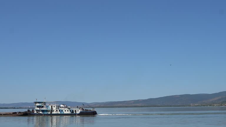 Cargo ship sails the river