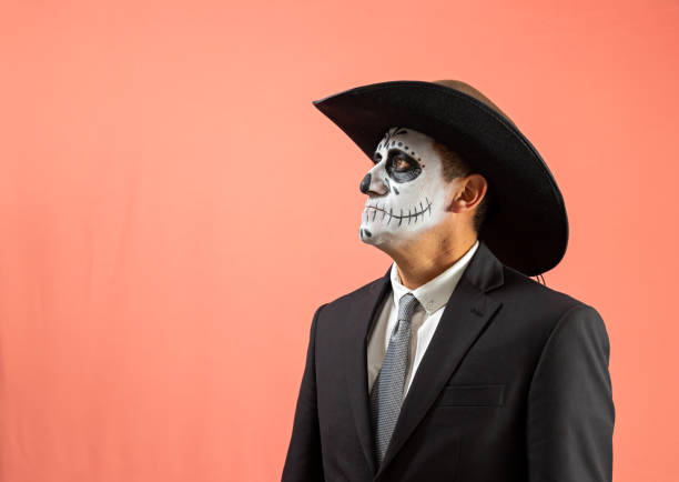 istock Man with catrin makeup wearing a hat 1277907728