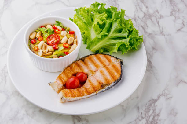 istock Spicy fried salmon salad 1277908735