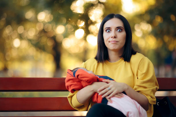 Mom Feeling Insecure Holding Newborn Baby