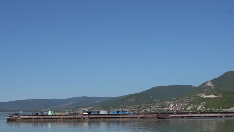 Cargo ship sails the river